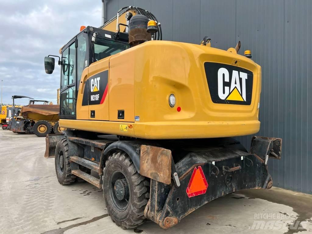 CAT M318F Bageri točkaši