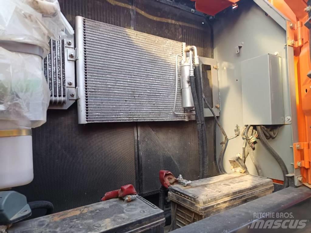 Hitachi ZX210 Bageri guseničari