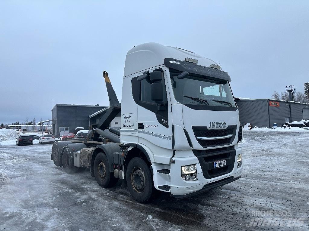 Iveco X-Way 560 8x2 Rol kiper kamioni sa kukom za podizanje tereta