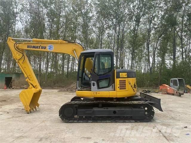 Komatsu PC128US Bageri guseničari