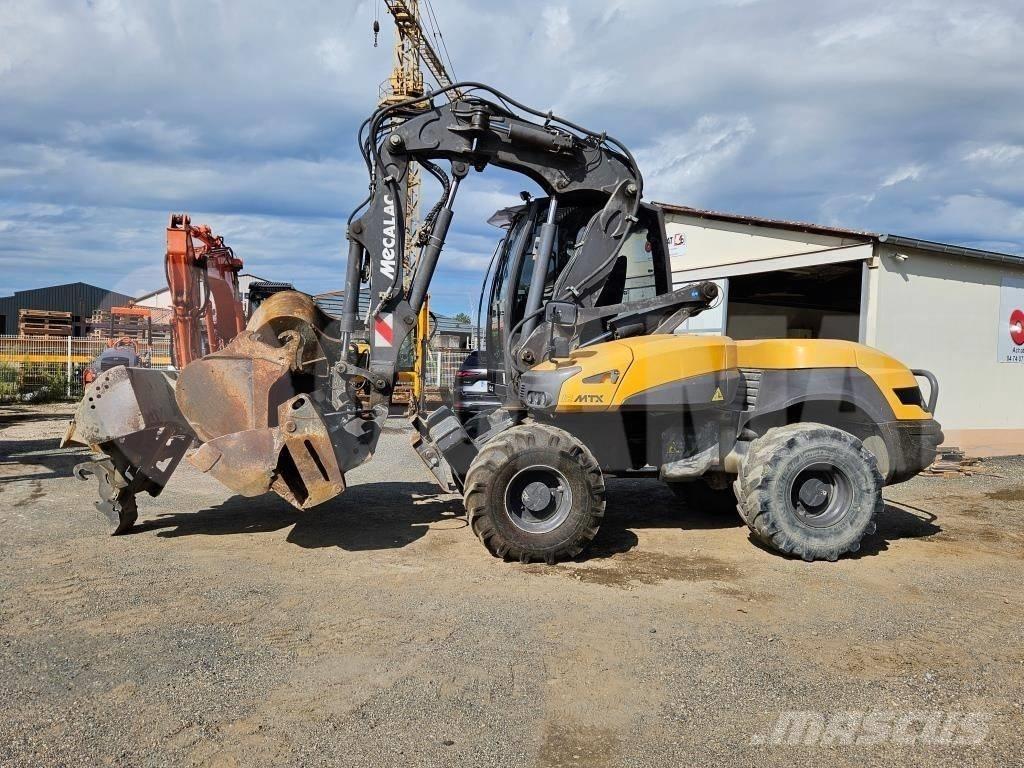 Mecalac 12 MTX Bageri točkaši