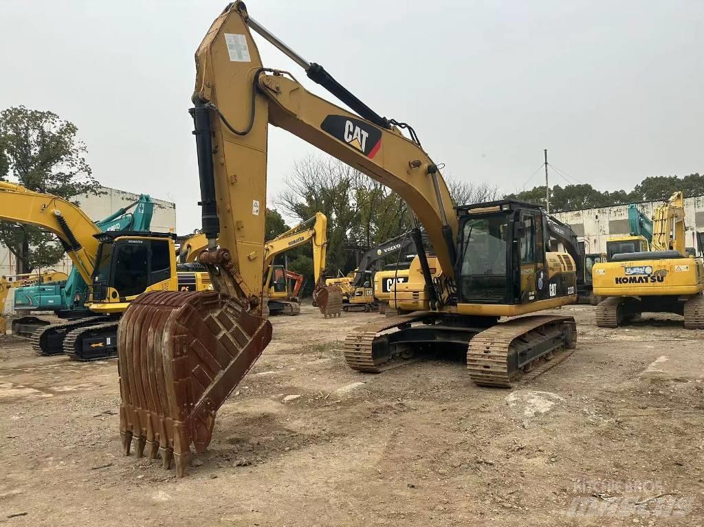 CAT 323D Bageri guseničari
