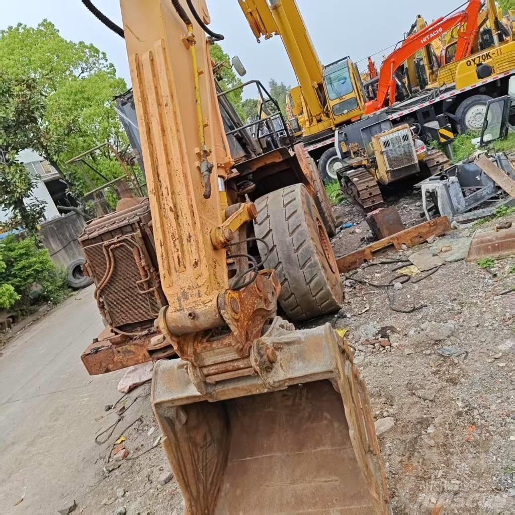 Hyundai Robex 220-9 Bageri guseničari