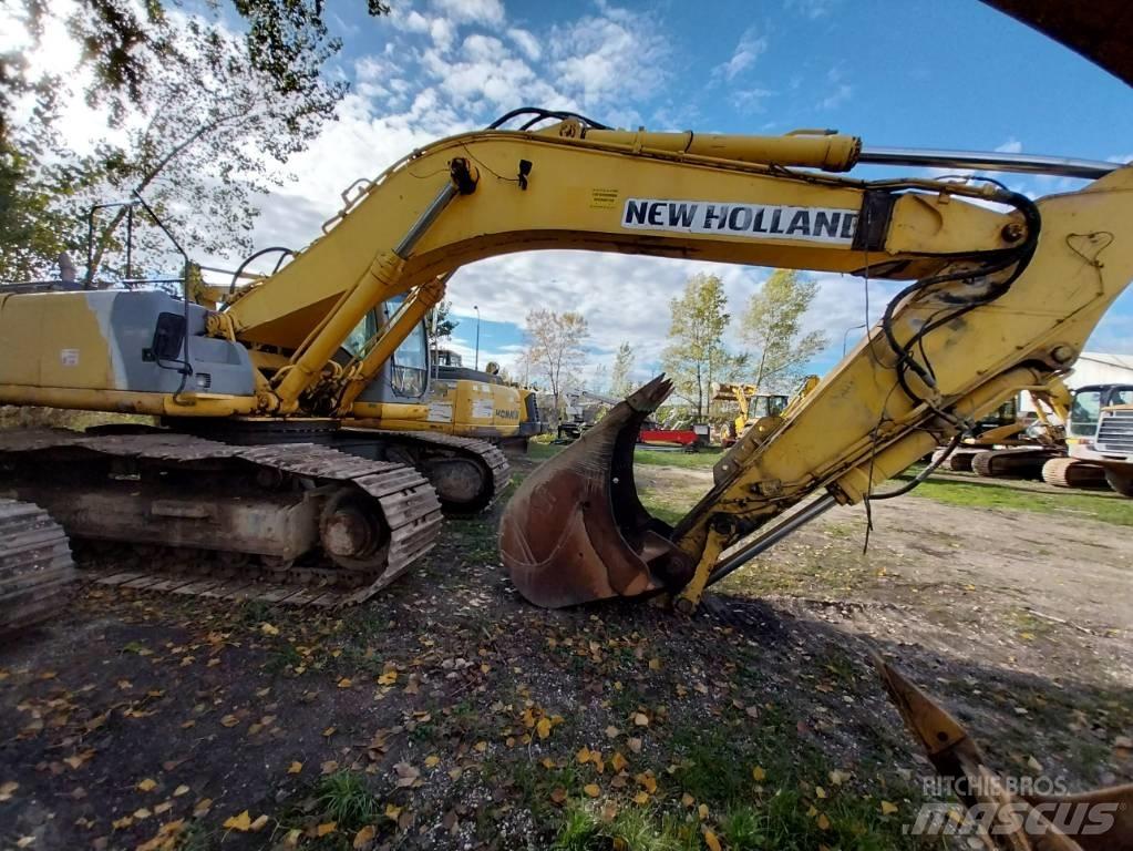 New Holland E 485 Bageri guseničari