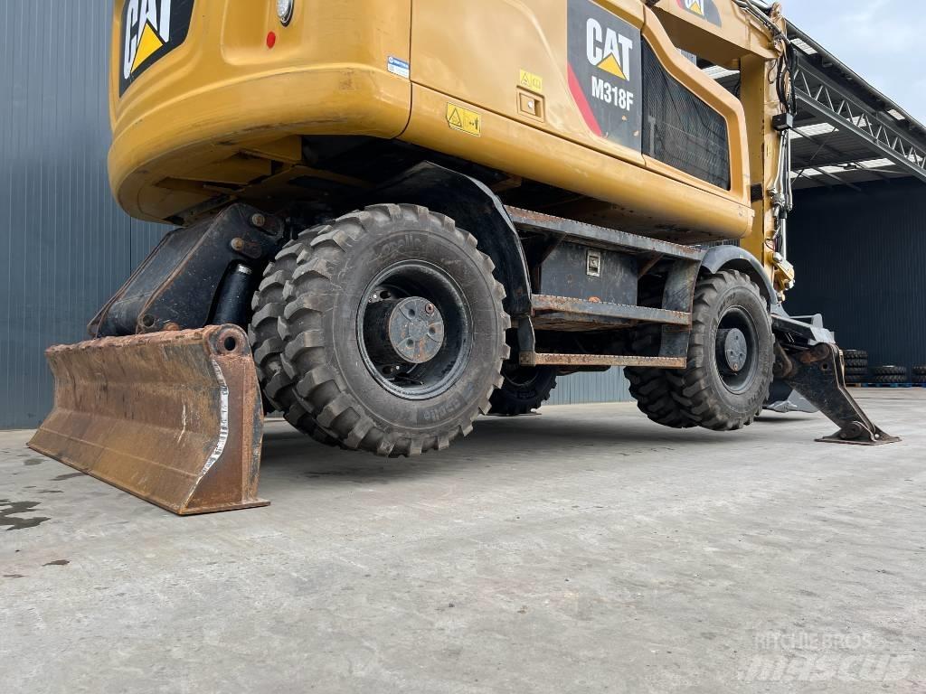 CAT M318F Bageri točkaši