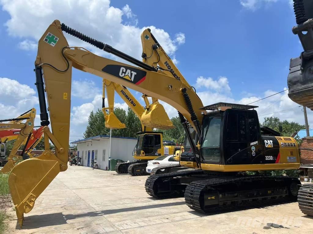 CAT 323DL Bageri guseničari