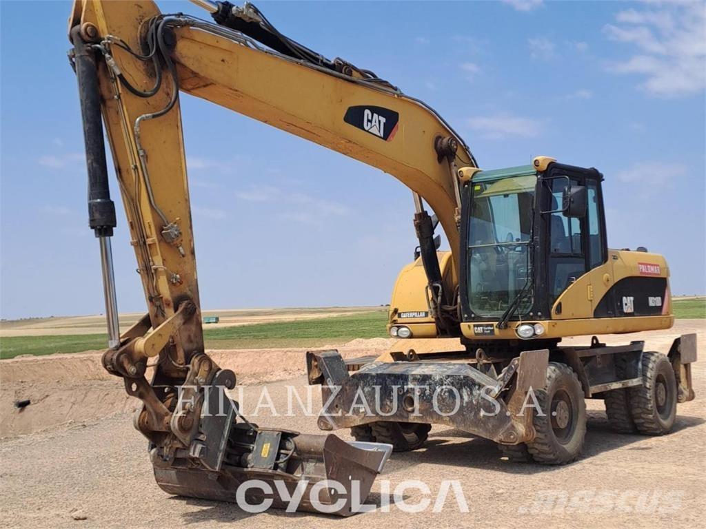 CAT M318D Bageri točkaši