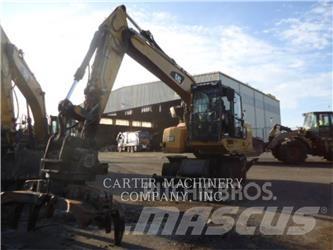 CAT M318F Bageri točkaši