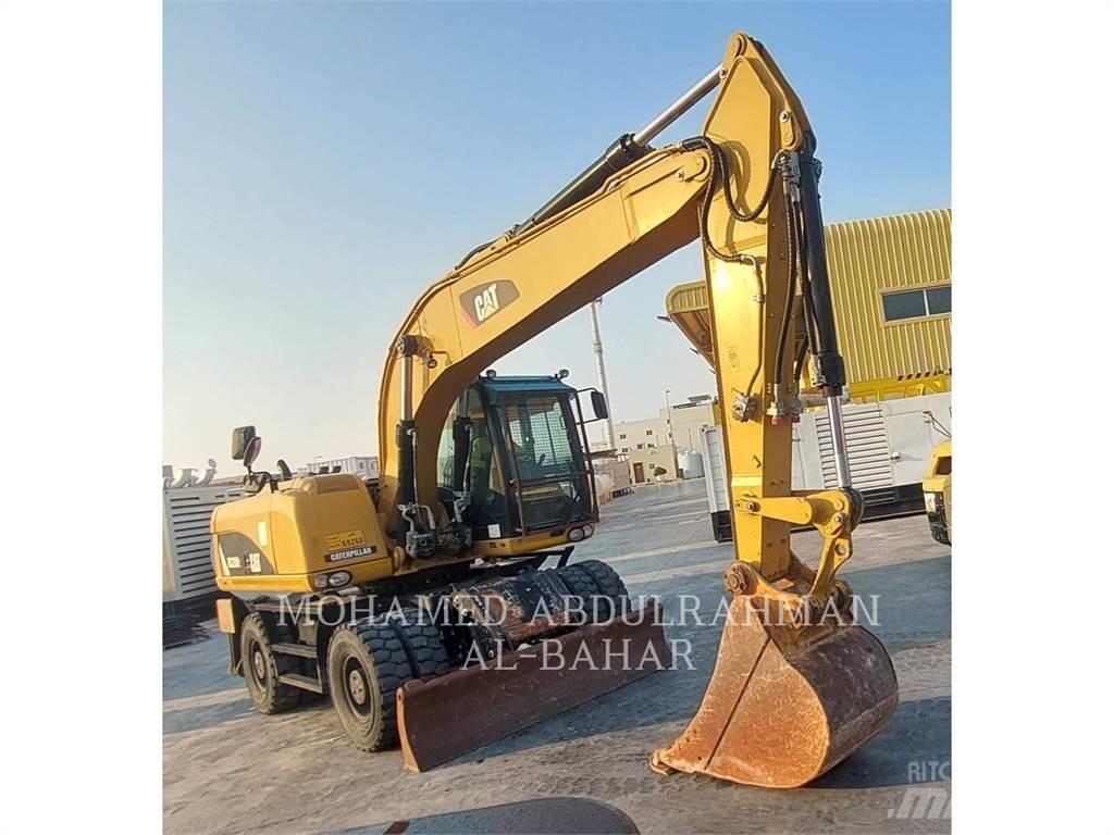 CAT M320D2 Bageri točkaši