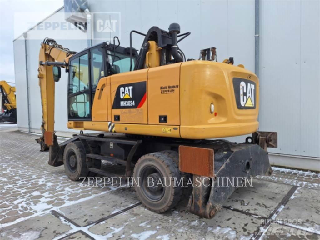 CAT MH3024-06C Bageri za rušenje