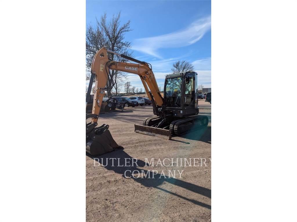New Holland CX60C Bageri guseničari