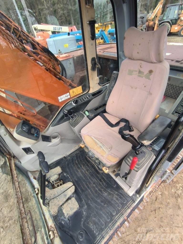 Fiat-Kobelco E 135 Bageri guseničari