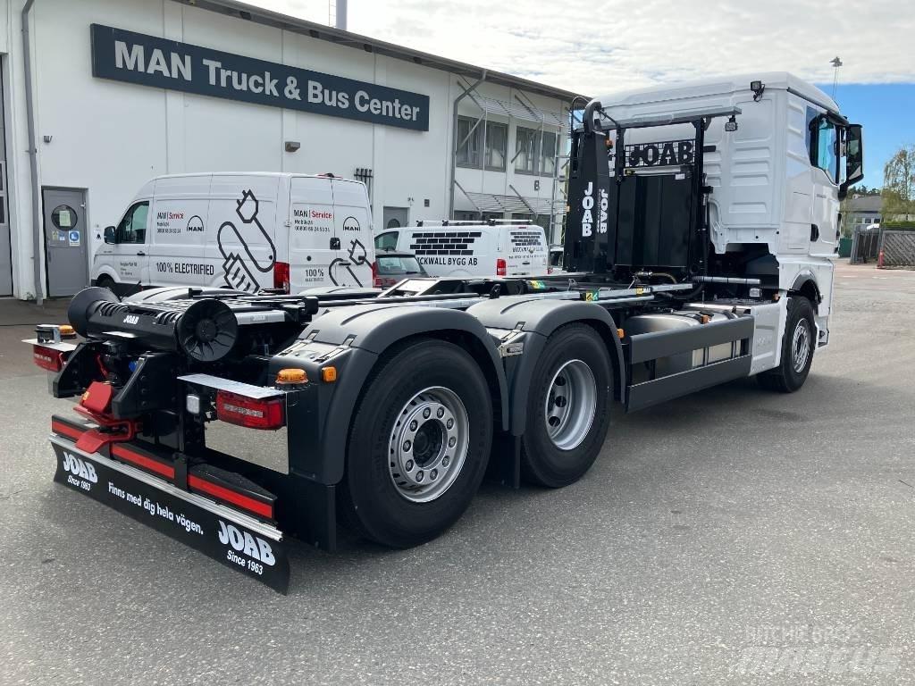 MAN TGX 26.520 Rol kiper kamioni sa kukom za podizanje tereta