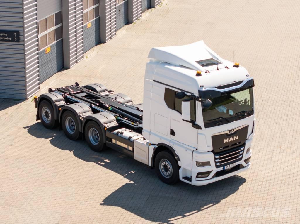 MAN TGX 35.520 Rol kiper kamioni sa kukom za podizanje tereta
