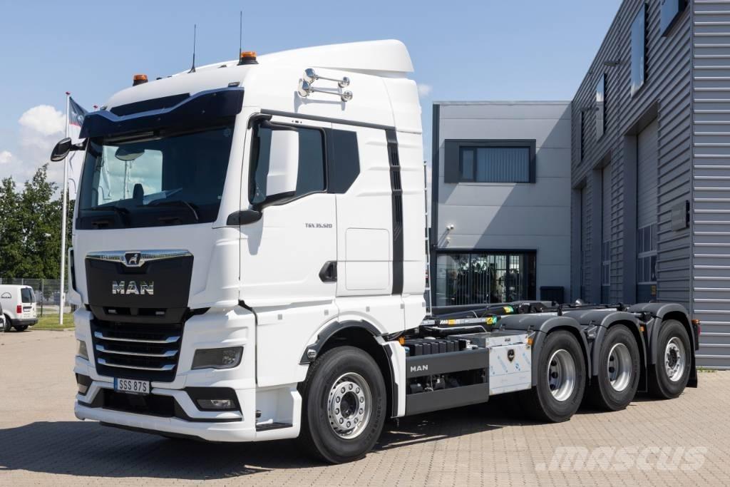 MAN TGX 35.520 Rol kiper kamioni sa kukom za podizanje tereta