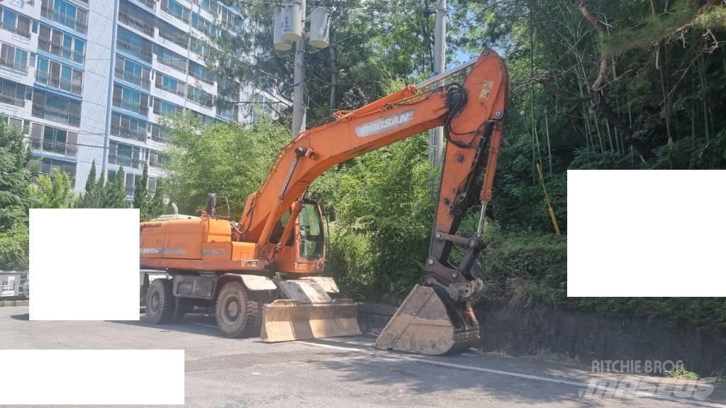 Doosan DX 210 W Bageri točkaši