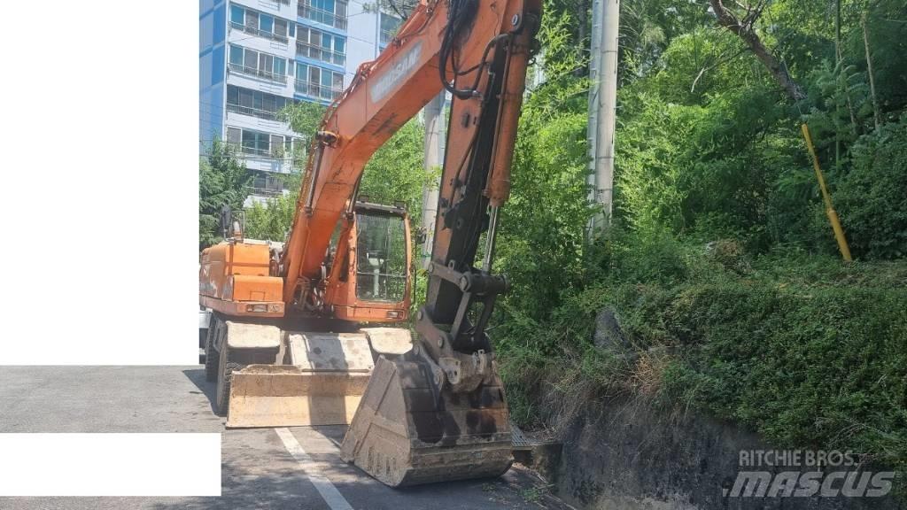 Doosan DX 210 W Bageri točkaši