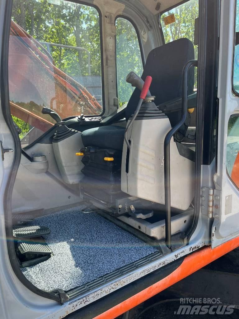 Fiat-Kobelco E 215 Bageri guseničari