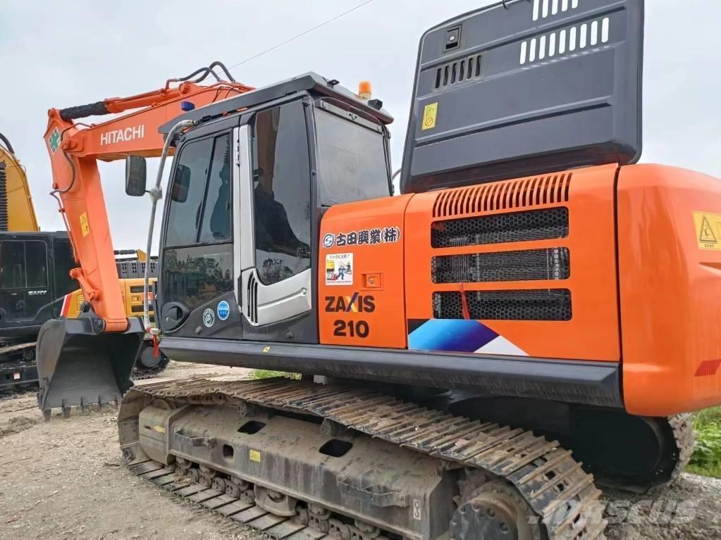 Hitachi ZX210 Bageri guseničari