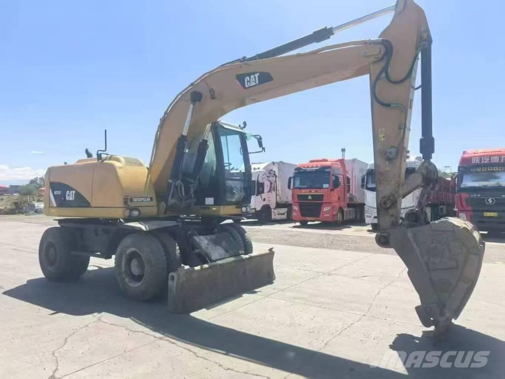 CAT M315D2 Bageri točkaši