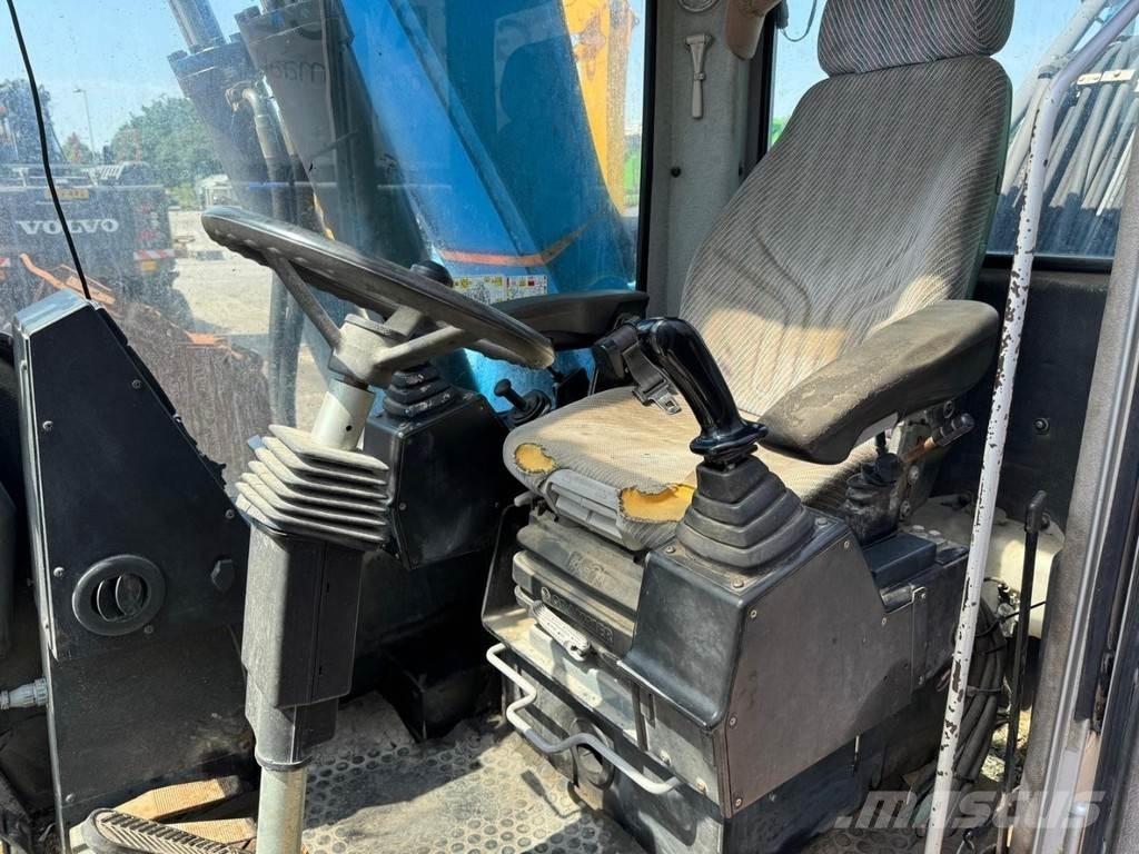 Fuchs MHL 320 Bageri za prenos primarnih/sekundarnih sirovina