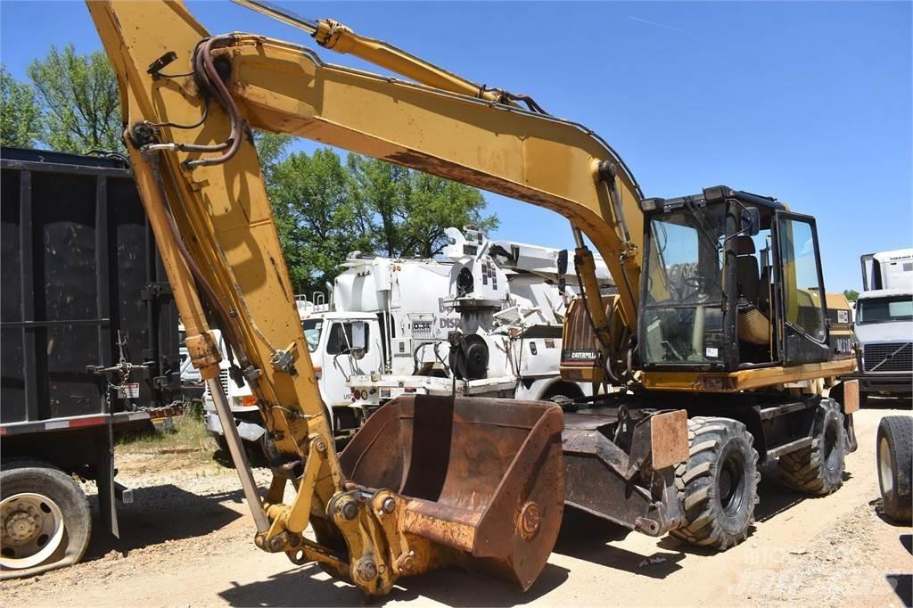 CAT M318 Bageri točkaši