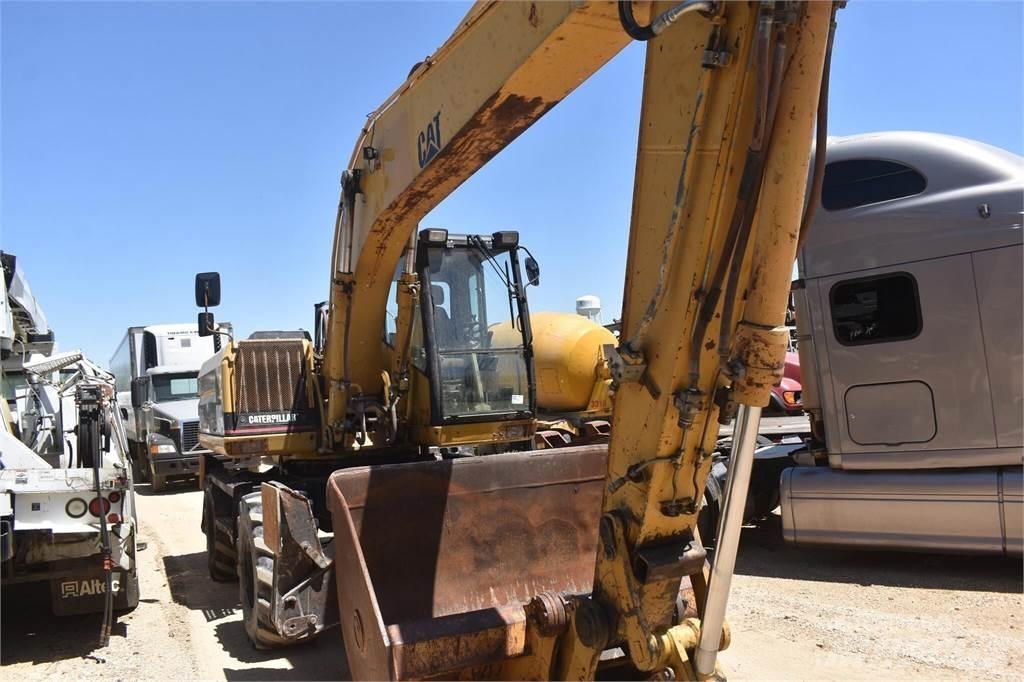CAT M318 Bageri točkaši
