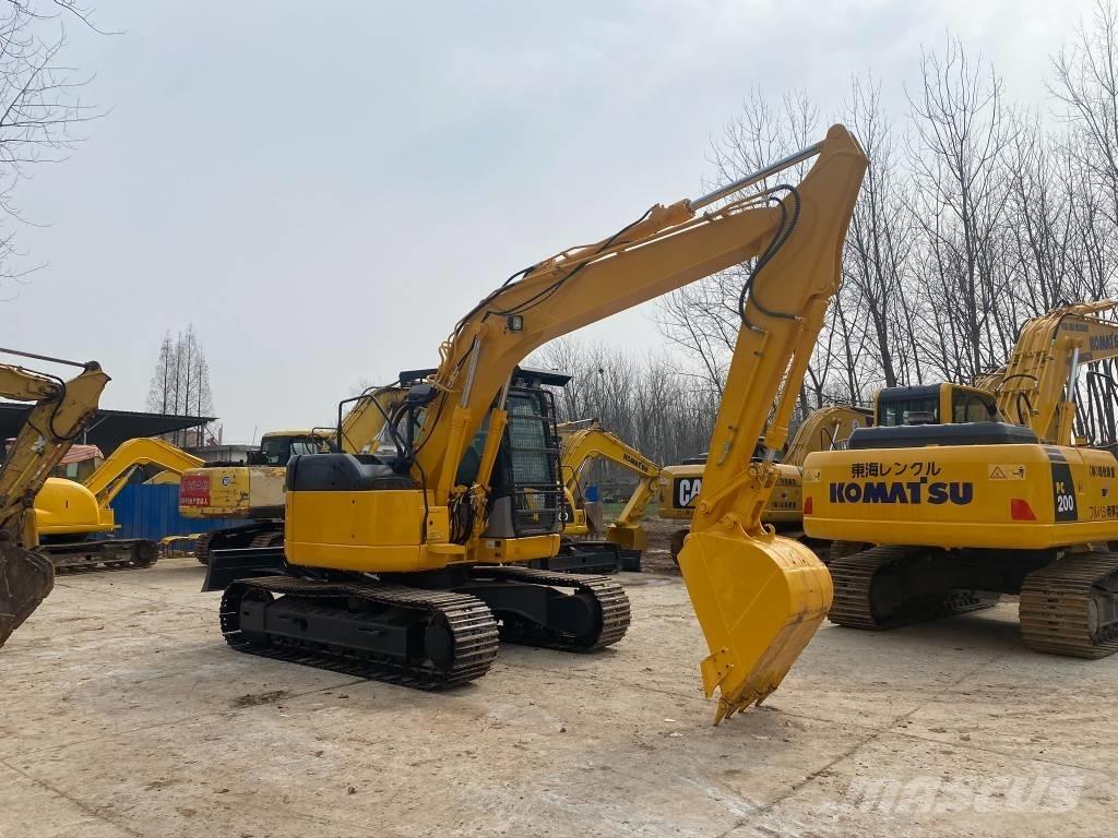Komatsu PC128US Bageri guseničari