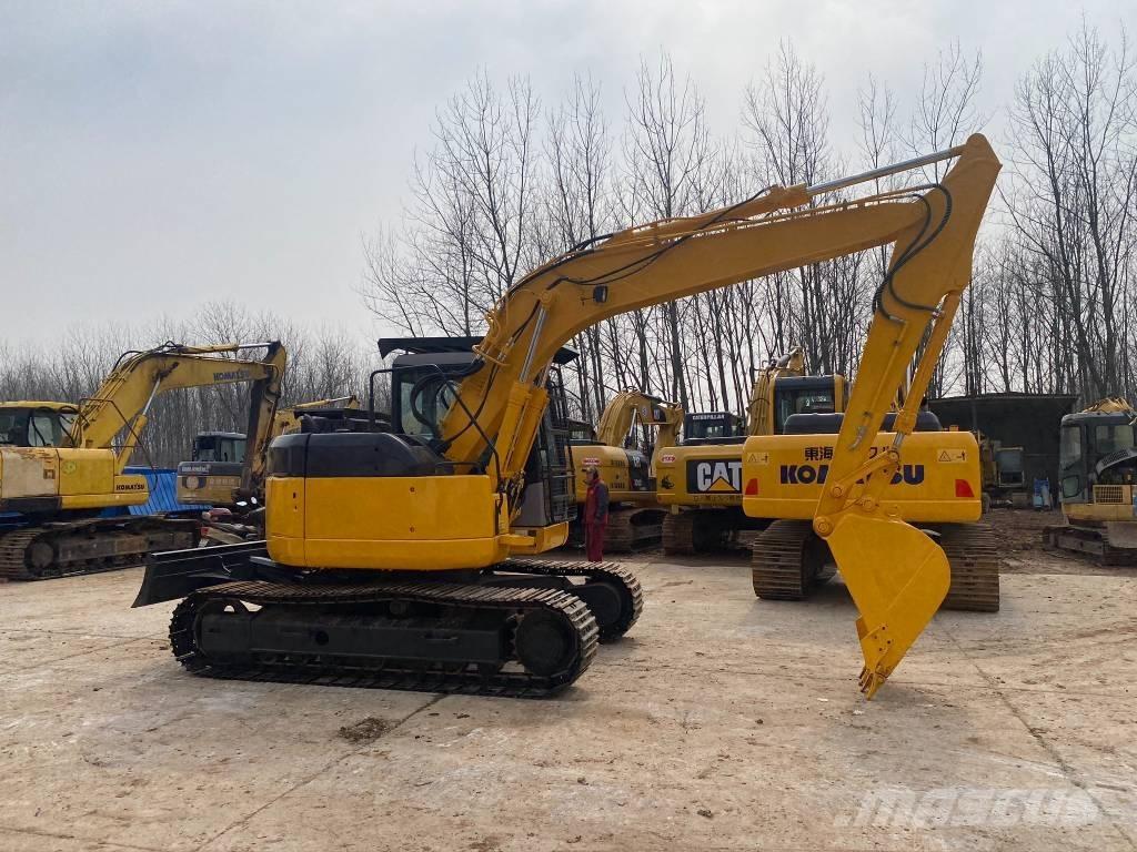 Komatsu PC128US Bageri guseničari