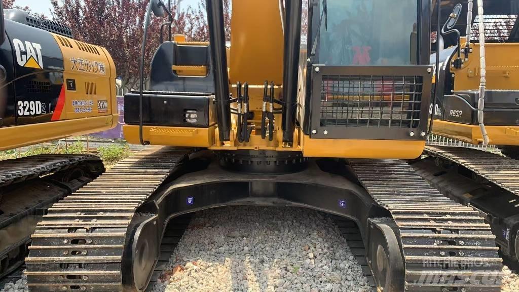 CAT 323 Bageri guseničari