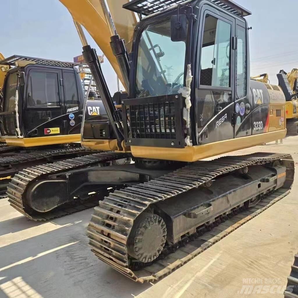 CAT 323 D Bageri guseničari