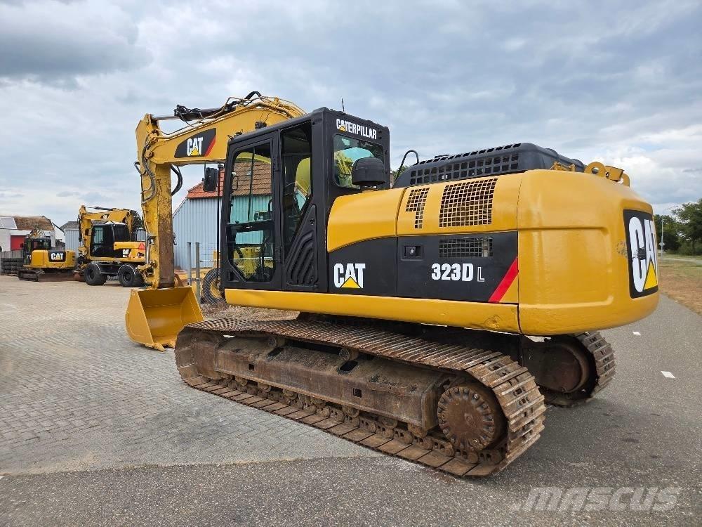 CAT 323DL Bageri guseničari