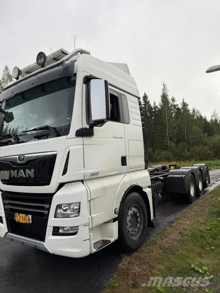 MAN TGX 32.580 Kamioni sa ravan platformom / vitlom