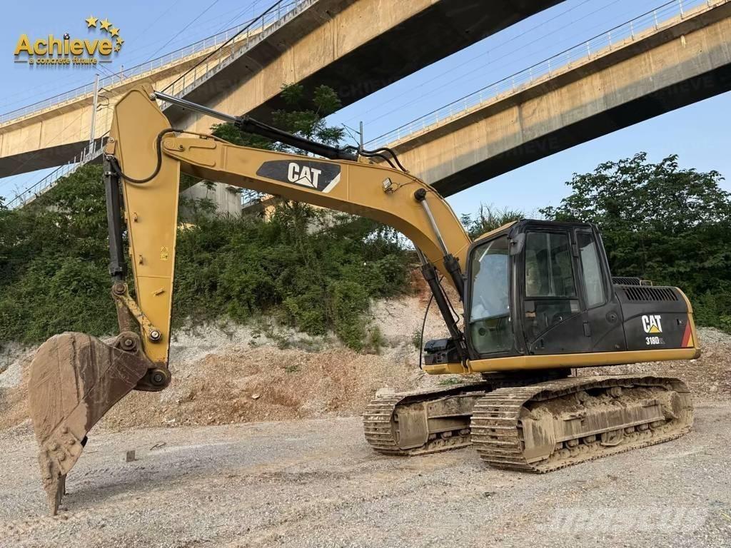 CAT 318DL Bageri guseničari