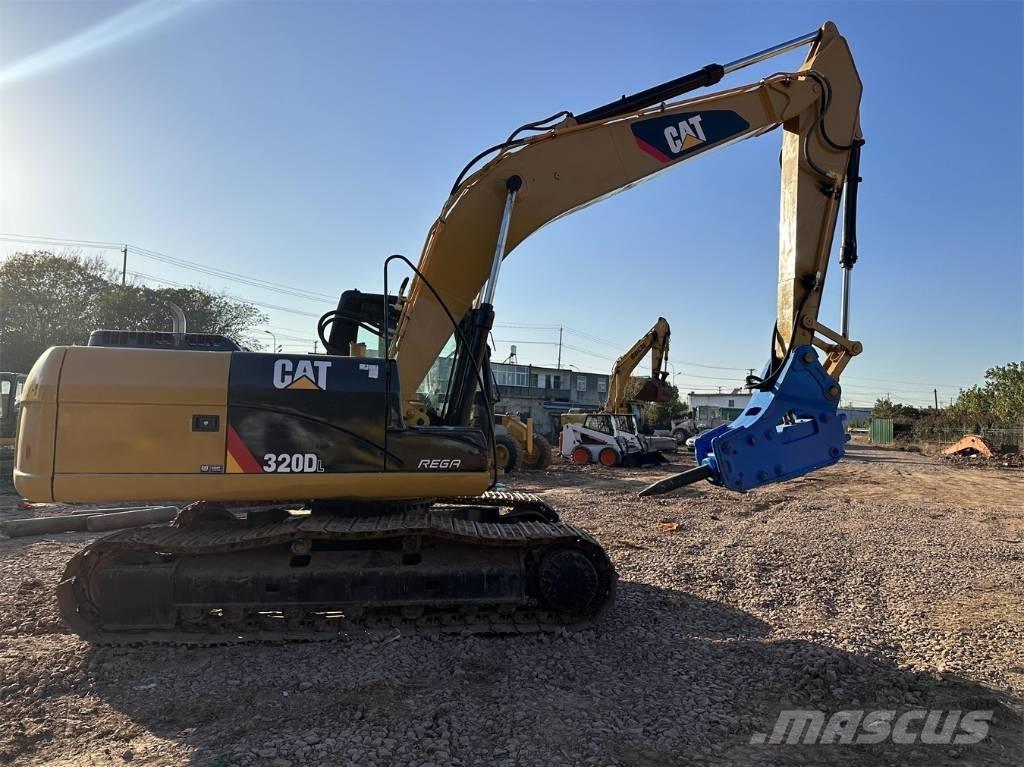 CAT 320 DL Bageri guseničari