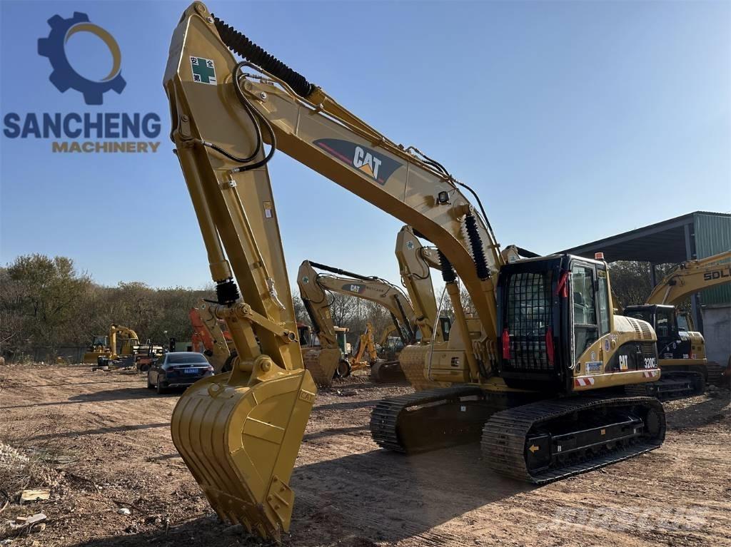 CAT 320CL Bageri guseničari