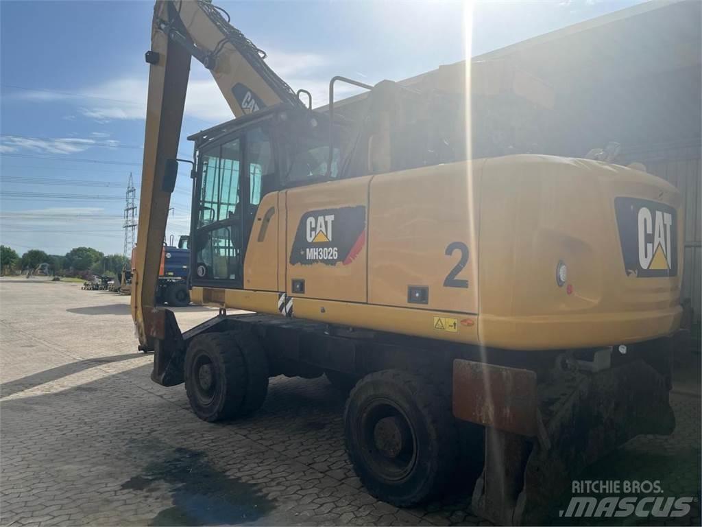 CAT MH3026 Bageri točkaši