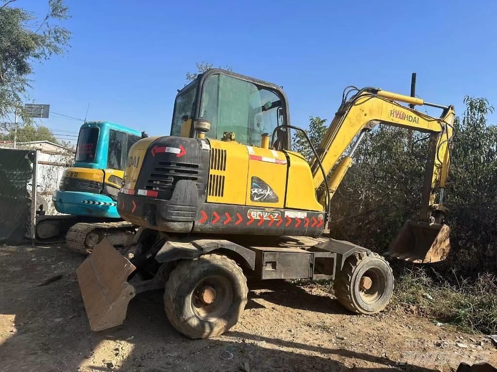 Hyundai R60W-7 Bageri guseničari