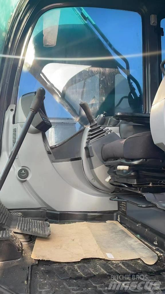 Kobelco SK 200 Bageri guseničari