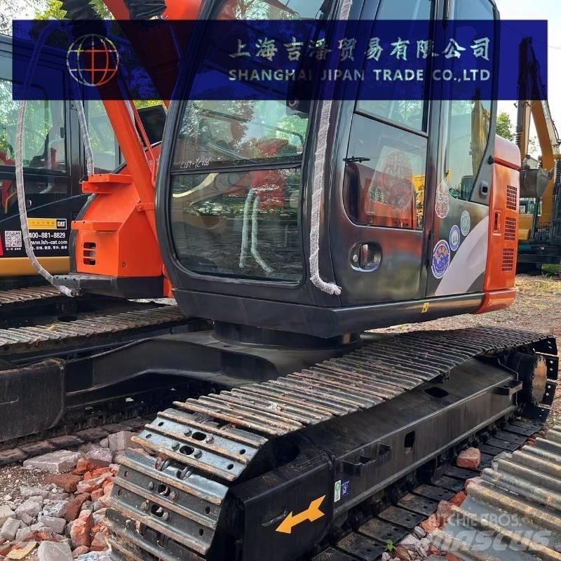Hitachi ZX 135 Bageri guseničari