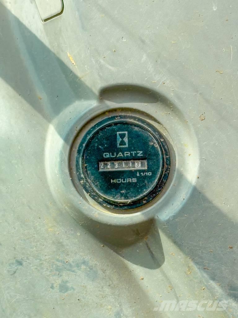 New Holland E 245 B Bageri guseničari