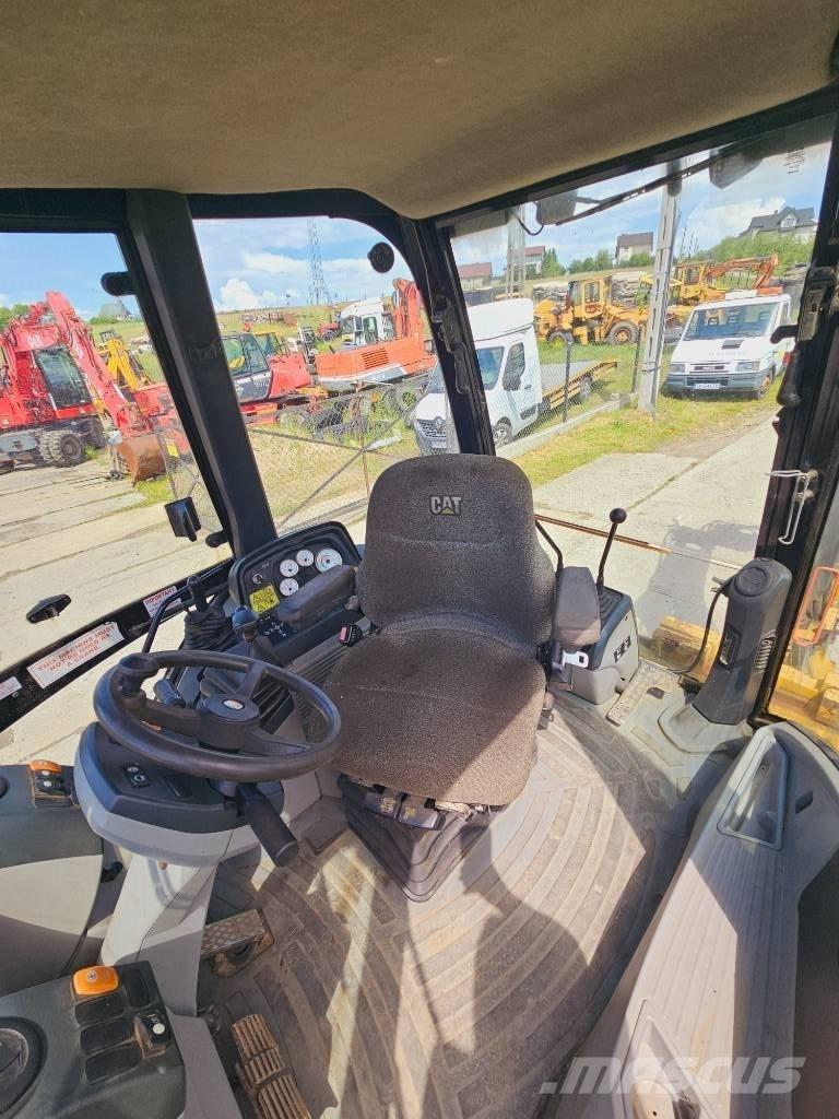CAT 428 E Rovokopači