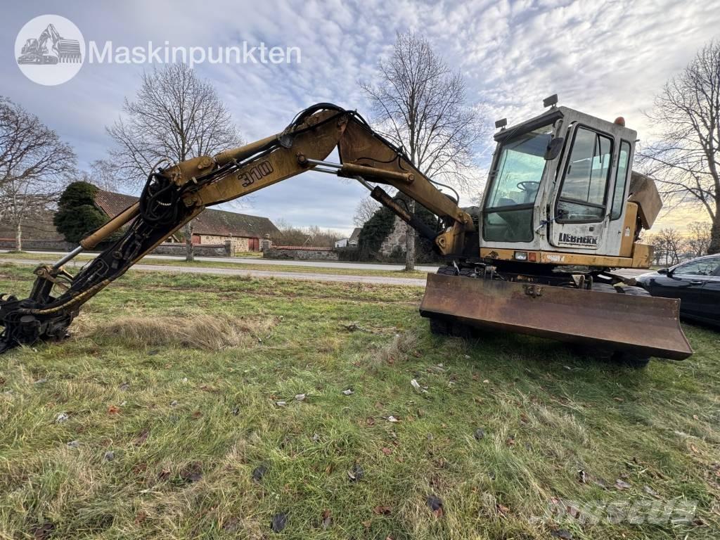 Liebherr A 310 B Bageri točkaši