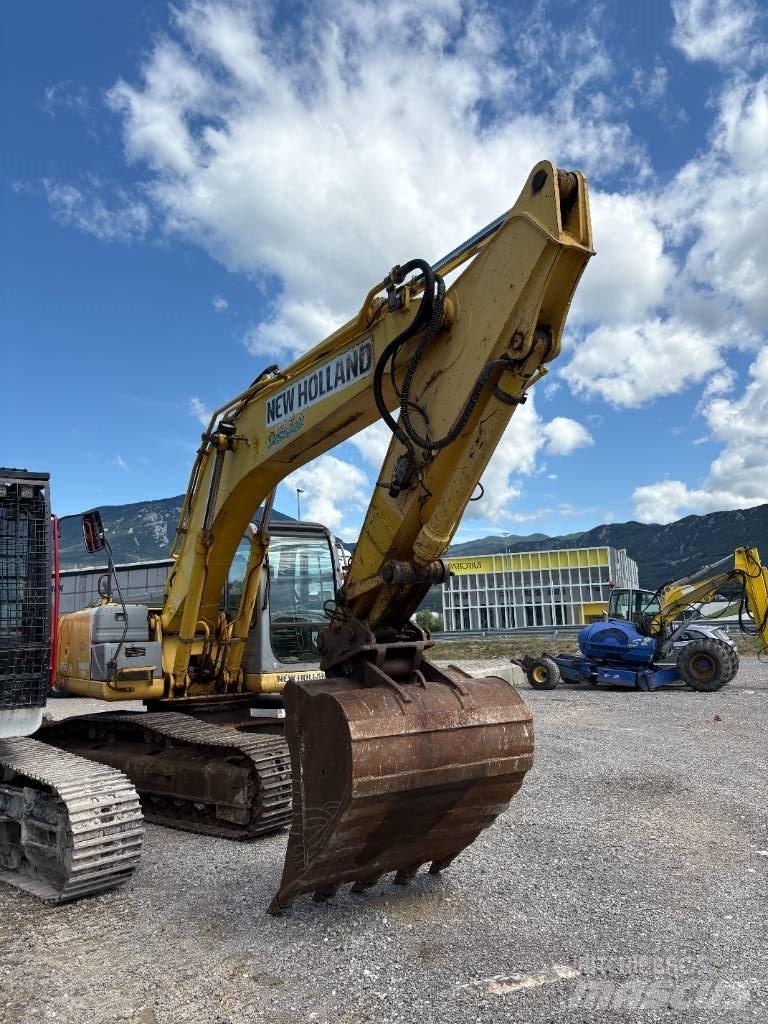 New Holland E 245 B Bageri guseničari