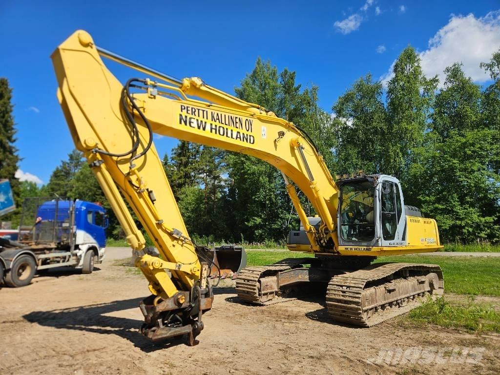 New Holland E 385 B Bageri guseničari