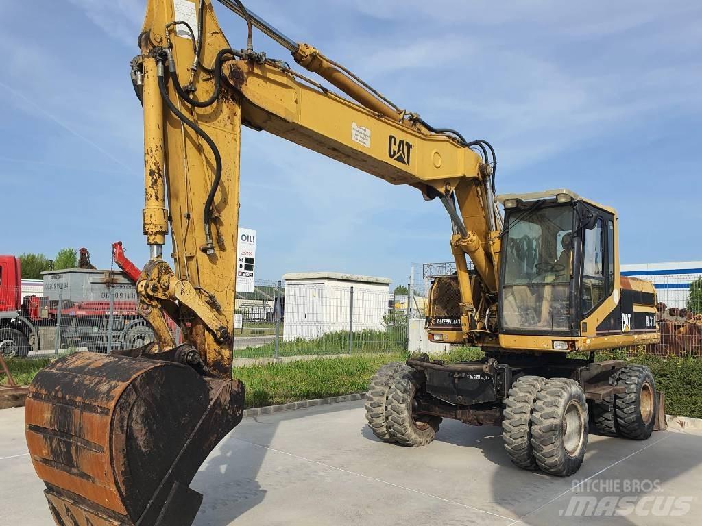 CAT M 318 Bageri točkaši