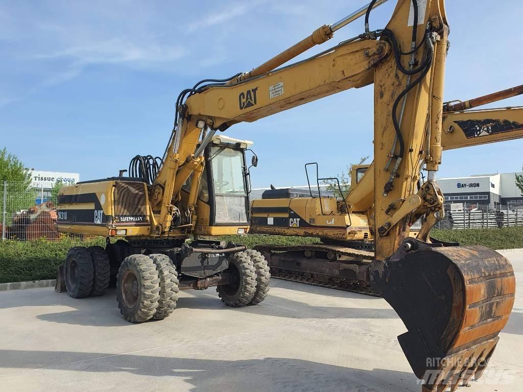 CAT M 318 Bageri točkaši