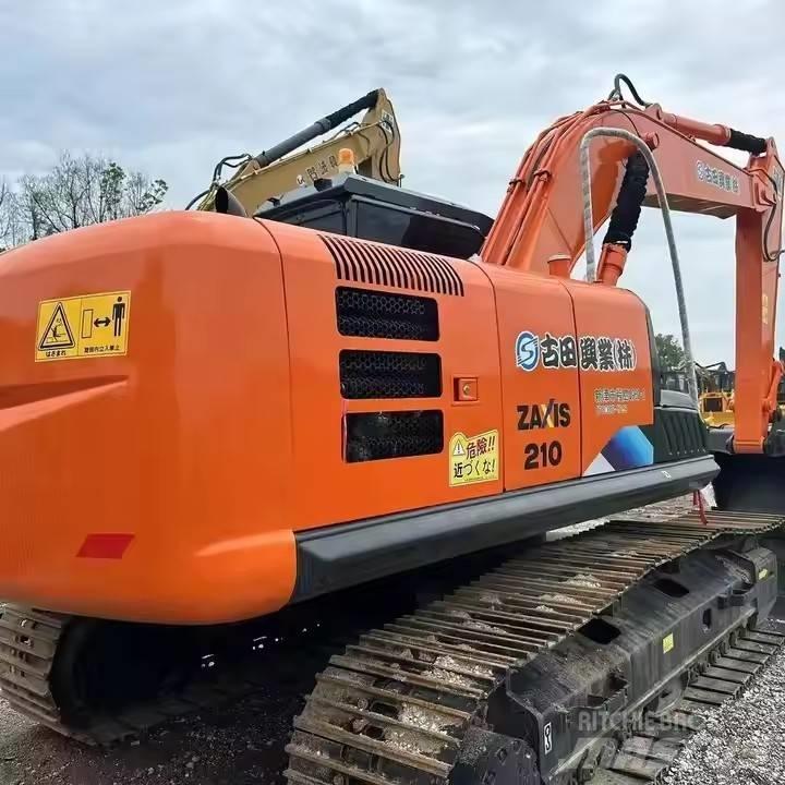 Hitachi ZX210 Bageri guseničari