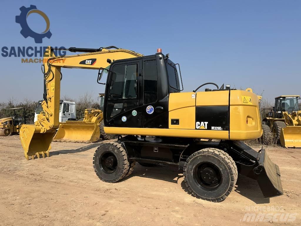 CAT M 320 D Bageri točkaši