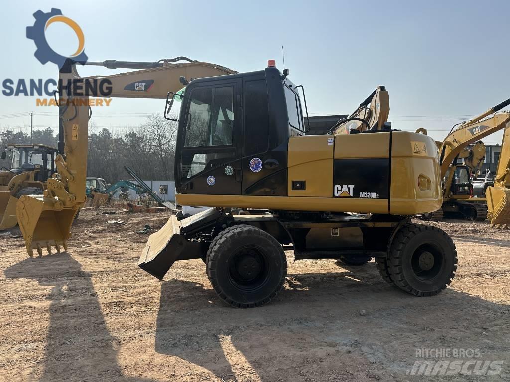 CAT M 320 D Bageri točkaši